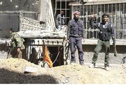 Free Syrian Army fighter - Reuters